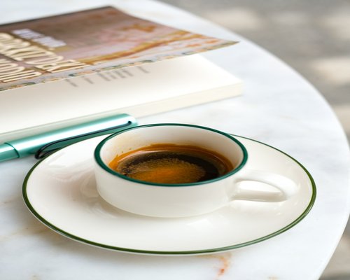 Relaxing reading a book with coffee break